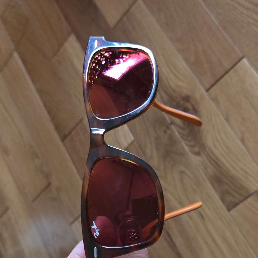 Ray-Ban Polarized Wayfarer Brn Tortise Shell Sunglasses with Orange/Purple Arms.